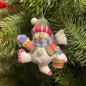 Festive Snowman Ornament with Colorful Scarf and Hat